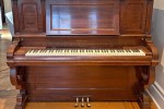 Antique upright piano