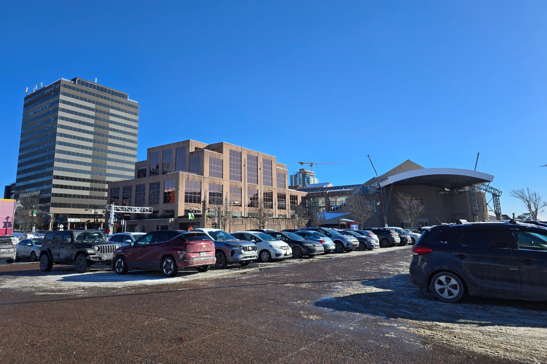 A mostly full parking lot along the Dartmouth waterfront on a winter day in Halifax