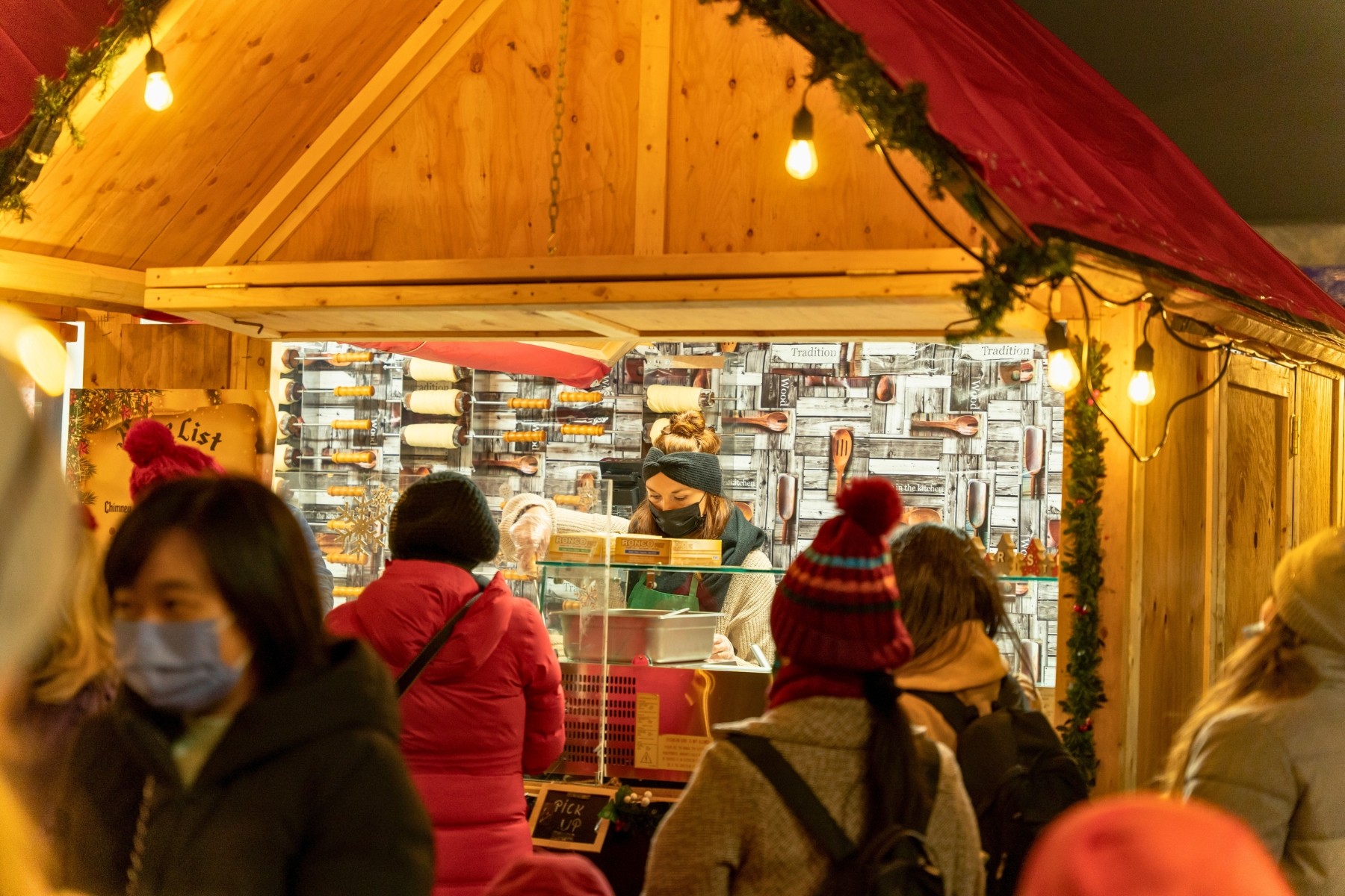 Canadians purchasing Christmas gifts from local makers at Christmas market