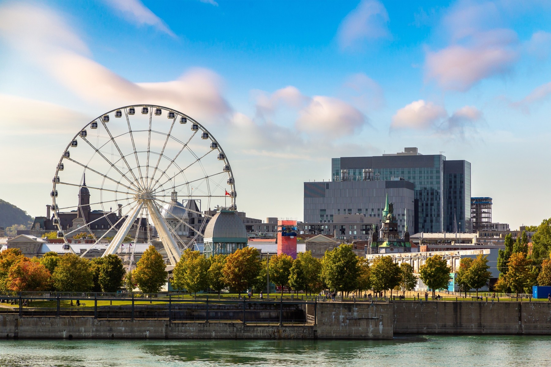 View of La Grande Roue de Montreal and cityscape of Montreal