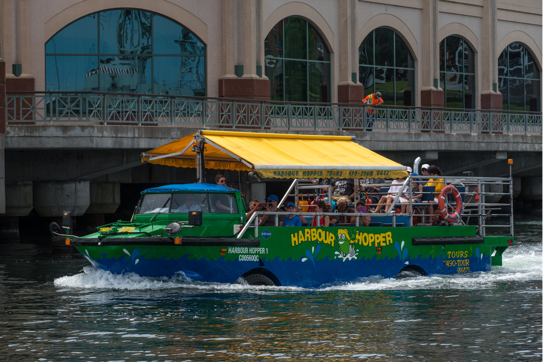 Complete sequence of the Harbour Hopper tour vehicle turning from a bus to a boat seen in the Halifax harbour