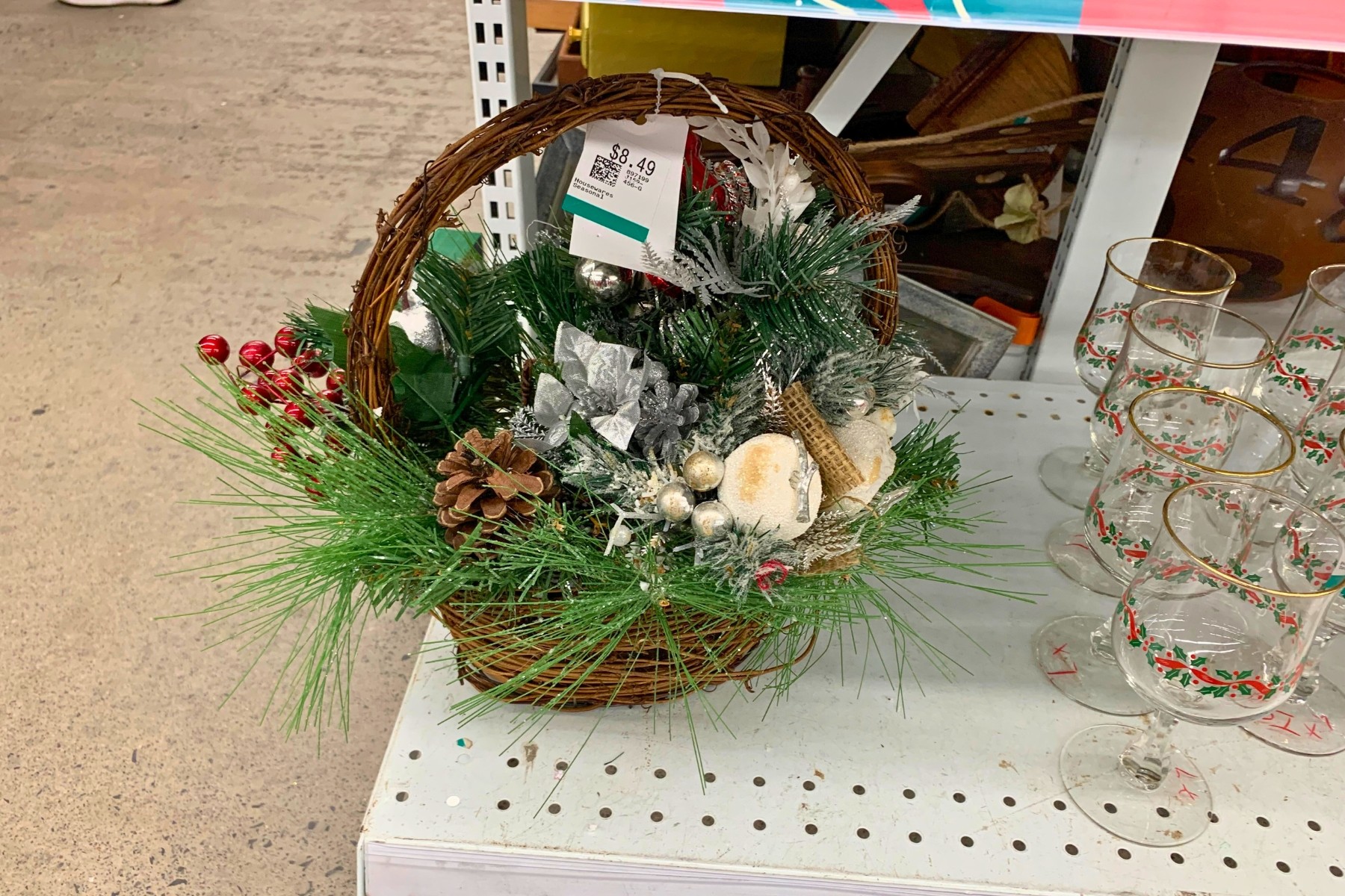 Christmas decor and glassware on display in Canadian thrift store for the festive season